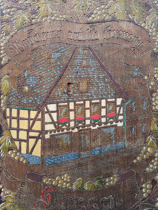 A rustic depiction of a half-timbered house celebrating Bacharach’s old-world charm.